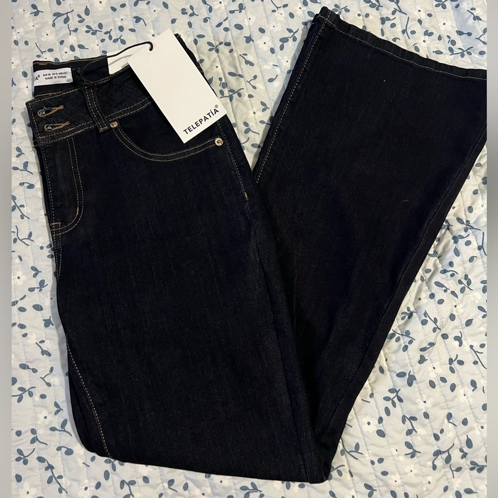 Telepatía Flare jeans- dark wash